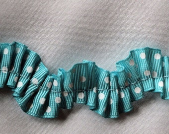Riley Blake Designs Grosgrain Gathered Aqua trim with white dots.