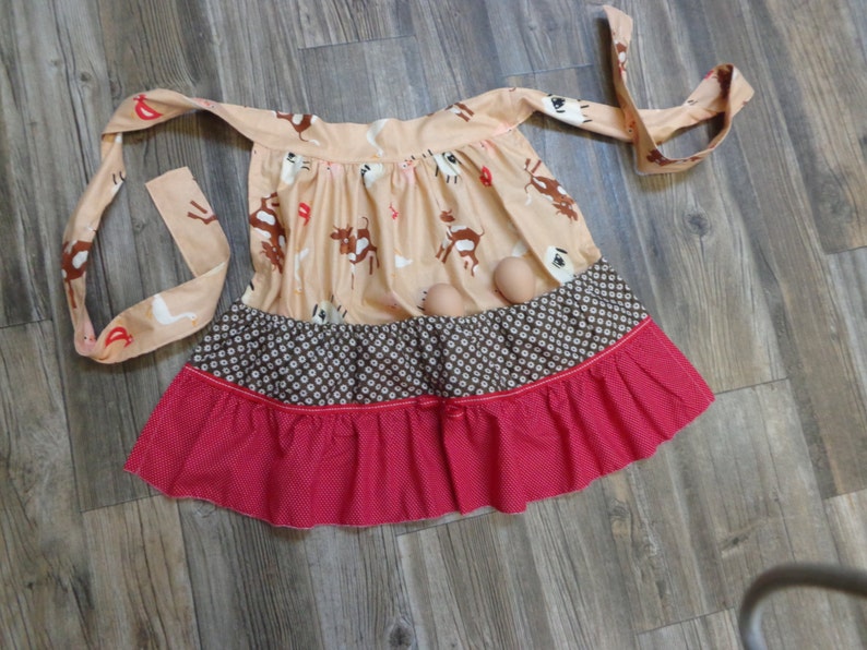 ..adult and child sizes... fabrics will vary Hen House apron