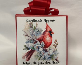 Cardinals Appear… Music box wrapped as a gift