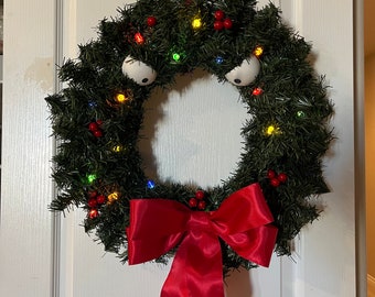 Nightmare before christmas   man eating christmas wreath with lights disney