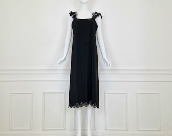 Comme des Garçons dress with floral shoulder straps