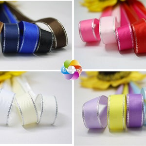 以下が含まれることがあります： 銀色の縁取りが付いたサテンリボン10色セット。リボンは幅2.5cmで、わずかにリブの入った質感です。色は緑、茶色、紺色、黒、ピンク、赤、クリーム、白、ラベンダー、黄色の10色です。