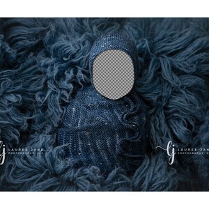 May include: A blue knitted baby wrap with a sparkly texture, perfect for newborn photography. The wrap is placed on a blue fluffy background.
