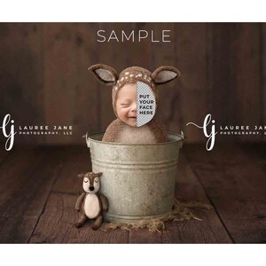 May include: A baby wearing a deer costume, including a hat with ears, sits in a metal bucket. A stuffed deer toy rests beside the bucket. The image has the text "SAMPLE" and "PUT YOUR FACE HERE". The background is a wooden surface.