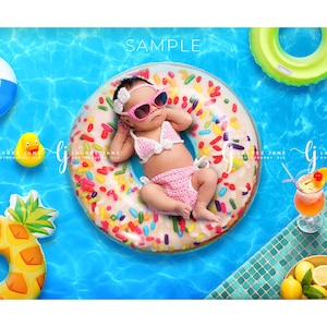 May include: A baby wearing a pink crochet bikini and sunglasses floats on a donut-shaped inflatable in a pool. The scene includes a beach ball, a rubber duck, a pineapple float, a cocktail, and the text "SAMPLE".