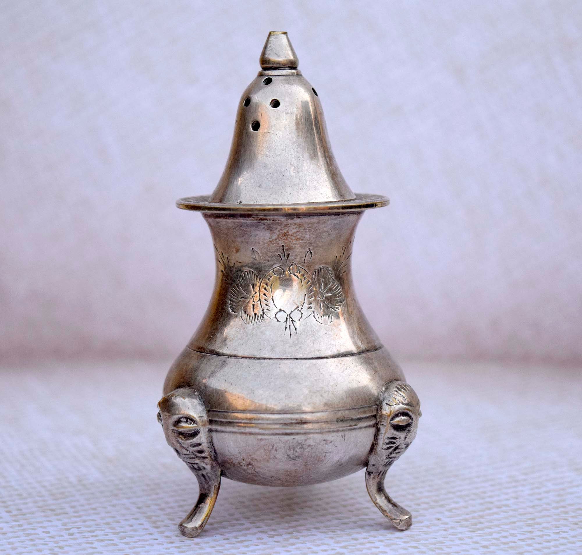 Antique salt and pepper shakers value best sale