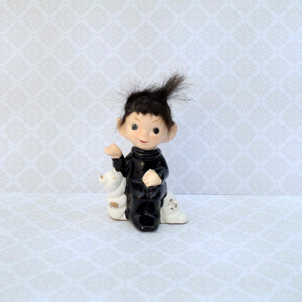 Vintage 'Foreign' Small Black Hair Pixie Elf Riding White Warm Ceramic Figurine Collectible Pixie