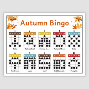 May include: A white Autumn Bingo game card with colorful boxes and the words "Autumn Bingo" in orange. Each box contains a different pattern of black dots and a corresponding autumn-themed word like "Rake" or "Pumpkin".