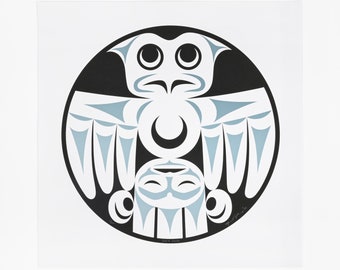 May include: A black and white circular design with a stylized owl with a crescent moon in its chest. The owl is in a blue-grey color. The design is on a white background.