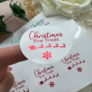 Weihnachtliche Leckerli Santa Schlitten Foiled Stickers.