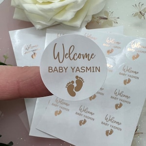 Gepersonaliseerde welkom baby shower verijdelde stickers. Feesttasstickers.