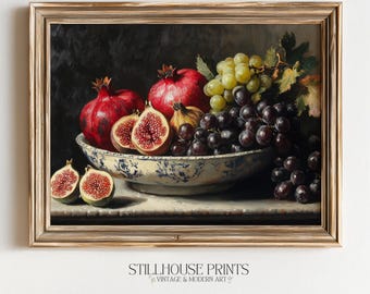 May include: A framed still life painting featuring a bowl overflowing with ripe fruit. The bowl is filled with pomegranates, figs, and grapes. The painting has a vintage aesthetic, with the text "STILLHOUSE PRINTS" at the bottom.