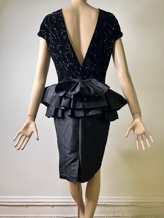 Black peplum cheap cocktail dress
