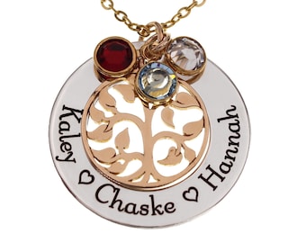 May include: Gold-tone necklace with a silver-tone pendant featuring a tree of life design. The pendant has three crystals and the names "Kaley", "Chaske", and "Hannah" engraved on it.