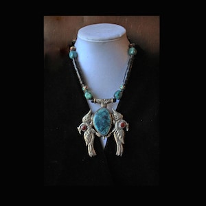 Double Sided Repousse Tibetan Silver Bird Pendant with Chrysocolla and Red Coral: Turquoise, Jigada Beads, Brass with Inlay & Matte Onyx