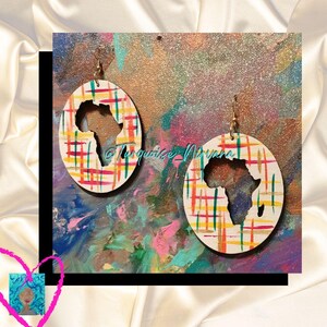 M-188: Pendientes africanos ovalados blancos