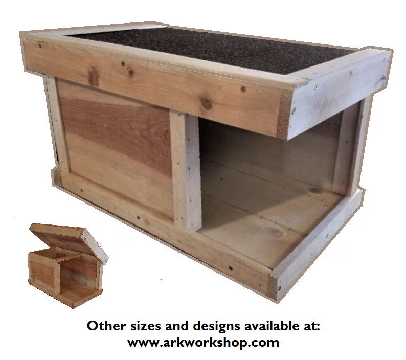 May include: A wooden dog house with a hinged roof that opens. The house is made of unfinished wood and has a simple design. Other sizes and designs are available at www.arkworkshop.com.