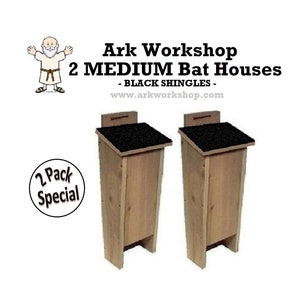 May include: Two wooden bat houses with black shingles. The bat houses are in a 2 pack special. The text on the image reads "Ark Workshop 2 Medium Bat Houses - Black Shingles - www.arkworkshop.com"