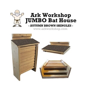 May include: A wooden bat house with a shingled roof. The house is made of natural wood and has a large opening for bats to enter. The house is labeled "Ark Workshop JUMBO Bat House - AUTUMN BROWN SHINGLES - www.arkworkshop.com".