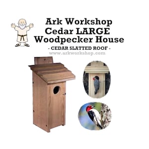 May include: Cedar woodpecker house with a slatted roof. The house is made of wood and has a round entrance hole. The house is shown with a woodpecker perched on the side. The text on the image reads "Ark Workshop Cedar LARGE Woodpecker House - CEDAR SLATTED ROOF - www.arkworkshop.com"