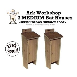 May include: Two medium bat houses with autumn brown shingled roofs. The wooden houses are rectangular with a slanted roof and a small opening at the top. The text on the image reads "Ark Workshop 2 MEDIUM Bat Houses".