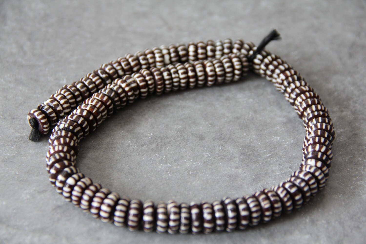 Buffalo Bone Carved Roundel Beads, 18 long full strand