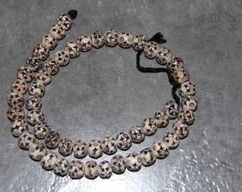 Buffalo Bone Star Carved Beads, 18" long full strand