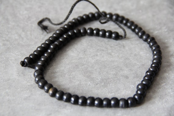 Black Horn 8x6mm roundel beads,  18" long full strand
