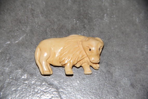 One Piece Buffalo Bone Carved Bull