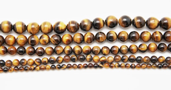 Tiger Eye 4-12mm smooth round beads 16" length full strand