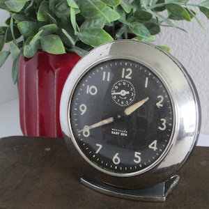 1950s Westclox BABY BEN clock - style 6 - black (gunmetal) case - nickel trim - black dial with luminous numerals (not working)