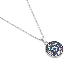 May include: A silver chain necklace with a round pendant featuring a blue and green enamel Star of David with Hebrew text around the edge.