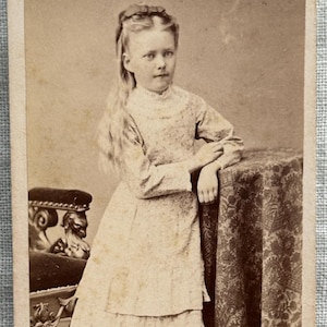 CDV of a young girl with long blonde hair / carte de visite.