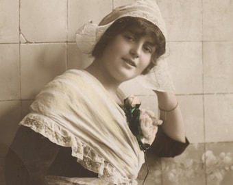Hand colored photo postcard of pretty girl. RPC, RPPC