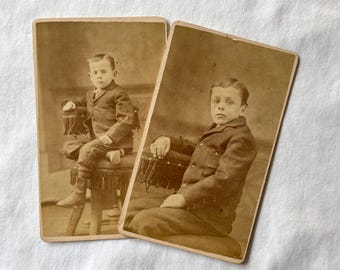 Two CDVs/ cartes de visite of brothers in the same studio setting.