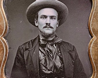 Daguerreotype of a Dashing Young Man wearing a hat. 1/6 Plate Daguerreotype in full case.