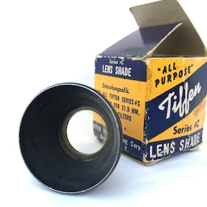 Tiffen series c lens shade and EdnaLite filter with original box and documentation