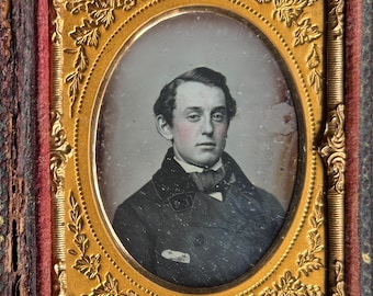 Sharp 1/9 plate daguerreotype portrait of a young man by C. V. Allen (Charles V. Allen) of Boston. Compete case.