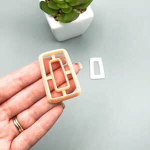A slight tapered rectangle clay cutter donut