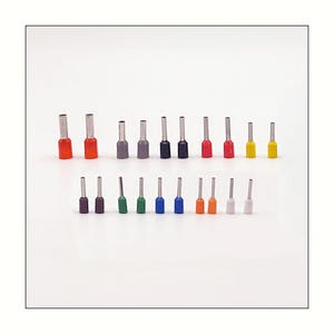 May include: An assortment of crimp terminals in a range of colours, such as red, grey, black, and yellow. These electrical connectors are arranged in two rows against a white backdrop. The terminals have a metal sleeve and coloured plastic insulation.