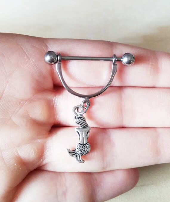 Covet Jewelry 316L Stainless Steel Turquoise Feather Headdress Nipple Bar Covet Jewelry 316L Stainless Steel Turquoise Feather Headdress Nipple Bar