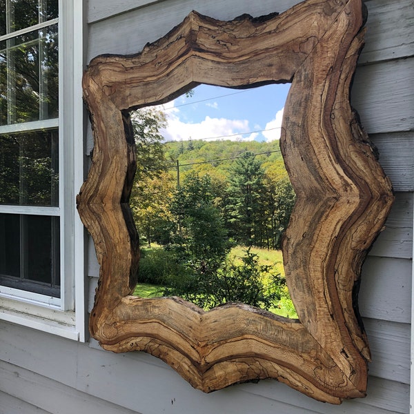 Spalted maple lodge style mirror from a single slab, live edge, book matched. 39" W, 40" H