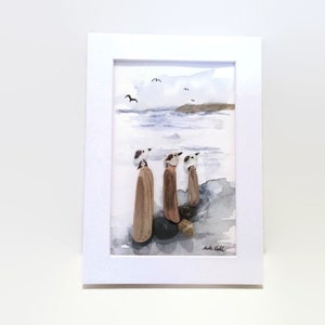 Watercolour&beach finds picture sitson a light background.