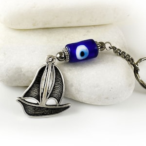 Evil eye keychain Sleutelhanger met Blue Glass Eye Bead en Metal Ship Sail Boat Charm, Griekse Mati