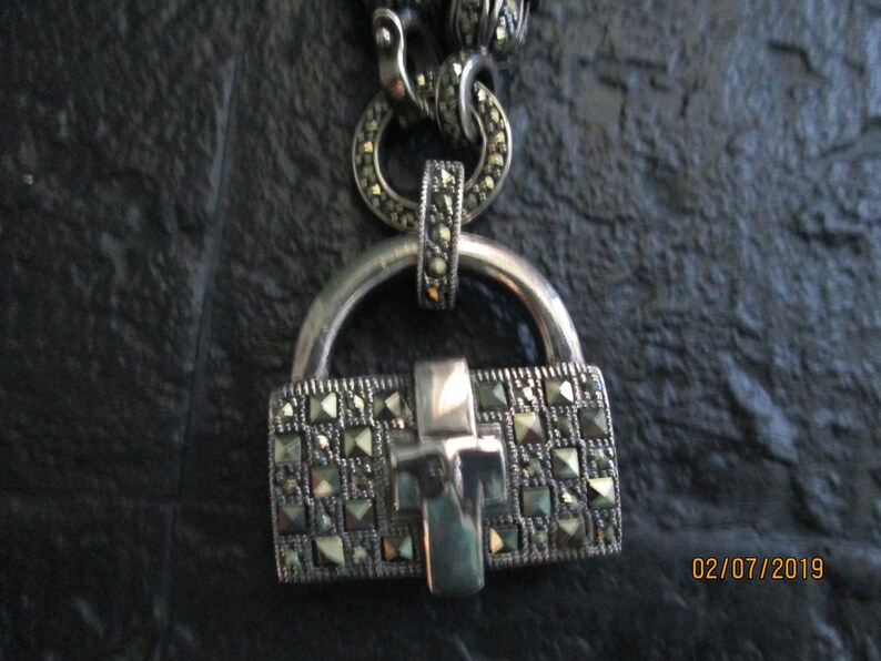 Ari D Norman Sterling Silver Marcasite Purse Pendant