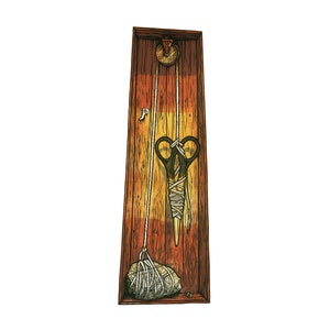 May include: A wooden box with a rope and a pair of scissors hanging from a pulley. A rock is tied to the end of the rope.