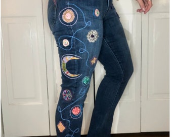 TAKING CUSTOM ORDERs. E,broidered and patched denim jeans.  Inspired by Outer Space. Available: Sz 10 W30-L32 LEVI'Sn