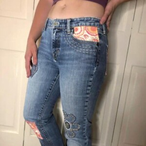 TAKING CUSTOM ORDERs. Wearable Art.Embroidered & Patched Jeans. My jeans or yours.  Highly Collectible.   For Sale:  Sz 6 1969 Classic Fit.