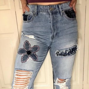Wearable Art. Embroidered & Patched Denim Jeans. My Jeans or Yours.   Available: Size 7 27" Button-Fly Jeans. Also taking custom orders.