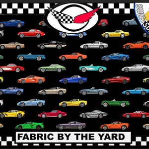 May include: A black fabric with a repeating pattern of colorful Corvette cars. The fabric has a checkered border and the text "FABRIC BY THE YARD" at the bottom.